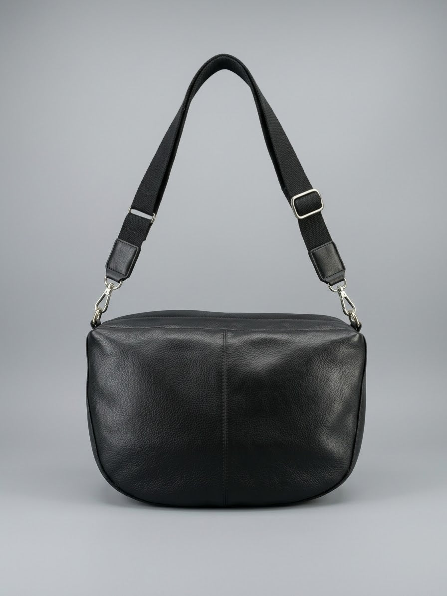 Stile' Nora black leather crossbody bag — back view with wide adjustable crossbody strap