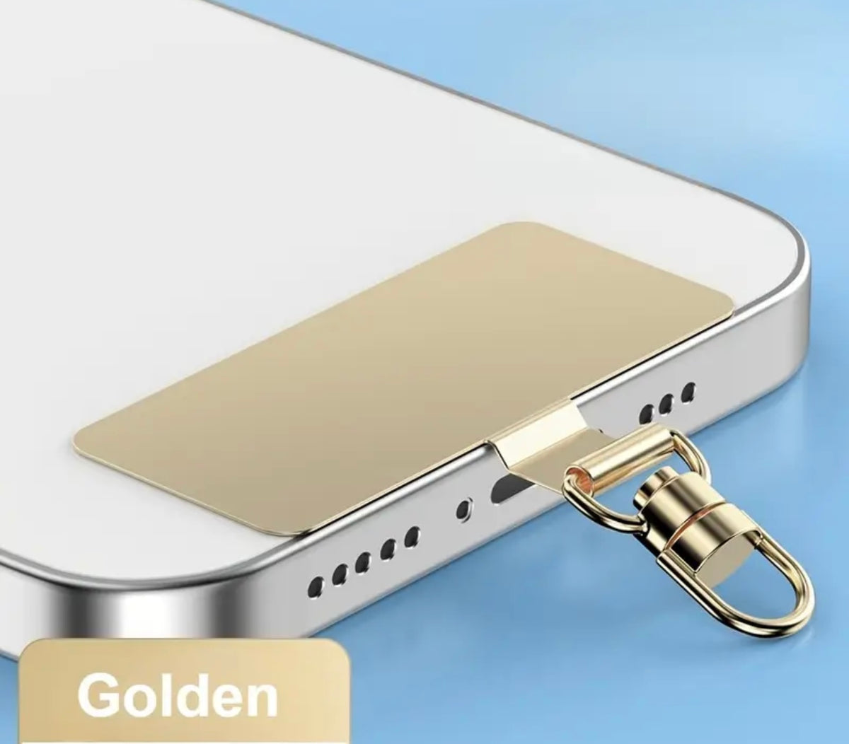 A close-up of a smartphone with a gold metal lanyard insert clip to attach a strap The word 'Golden' appears in a beige label at the lower left on a light blue background.